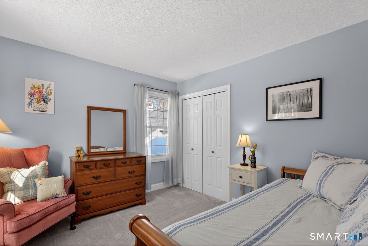 4 Hunters Ridge Road Killingworth, CT 06419 - Photo 33 of 40 a bedroom with a bed and furniture