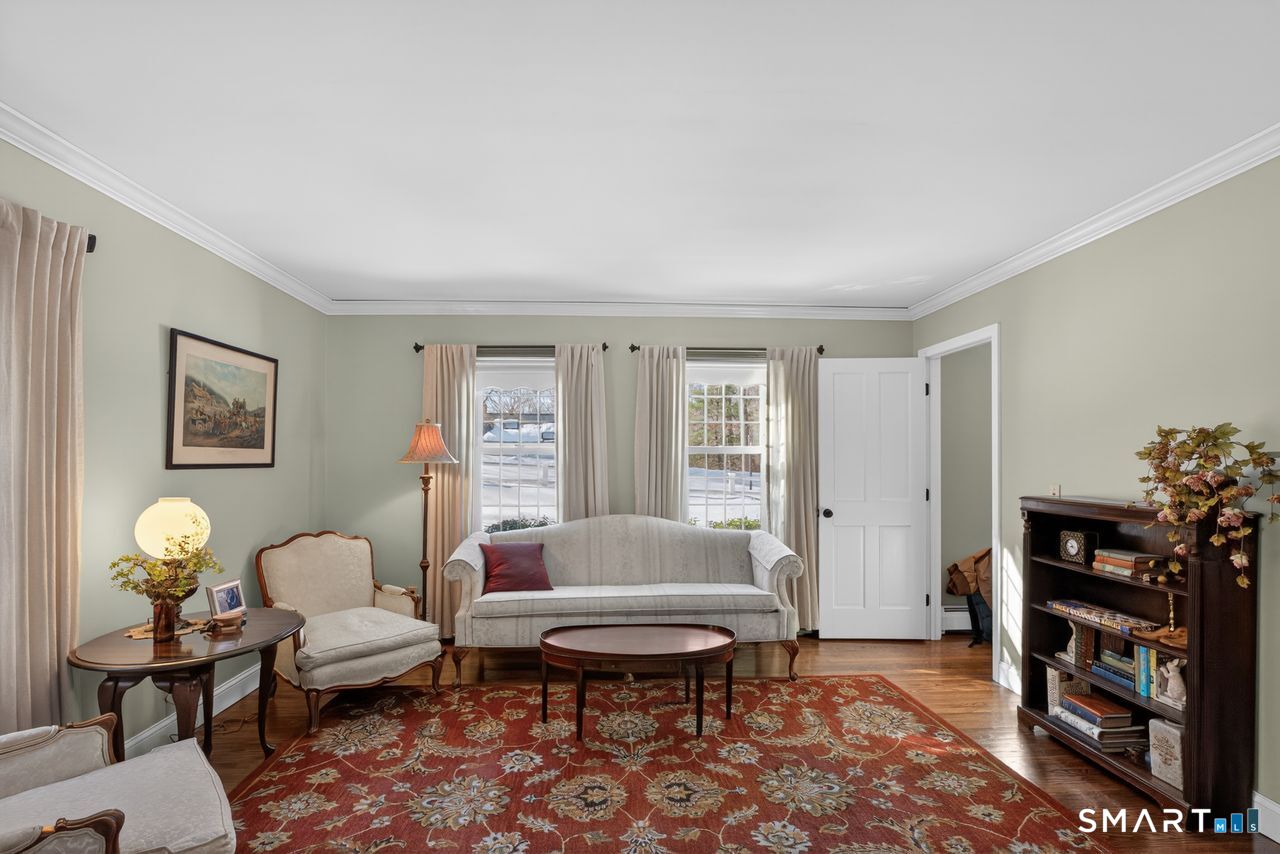4 Hunters Ridge Road Killingworth, CT 06419 - Photo 7 of 40 a living room with furniture and a bookshelf