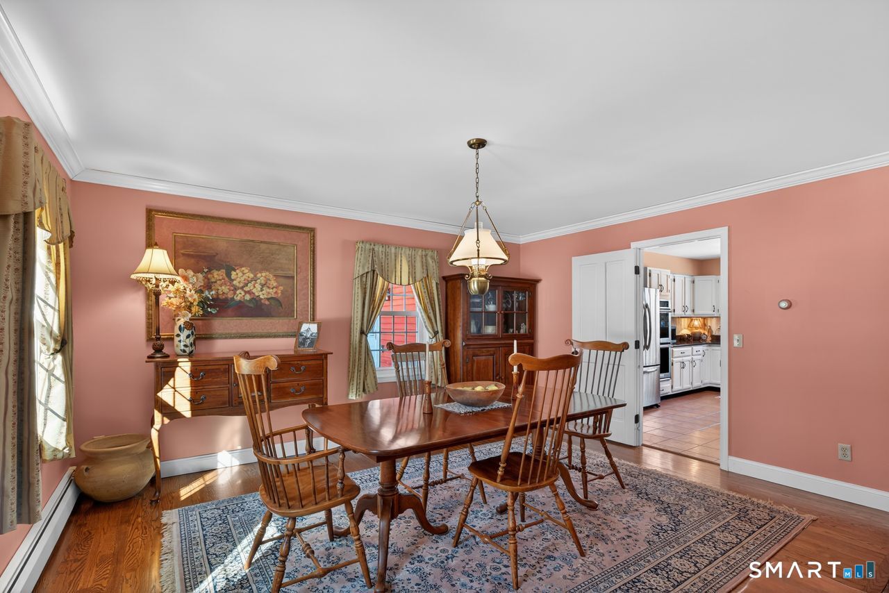4 Hunters Ridge Road Killingworth, CT 06419 - Photo 10 of 40 a view of a dining room with furniture window and wooden floor