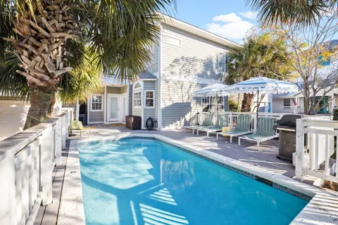 a bathroom with a sink vanity mirror and toilet
