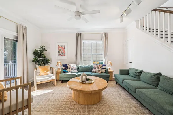 a kitchen with stainless steel appliances granite countertop a sink a refrigerator and a stove