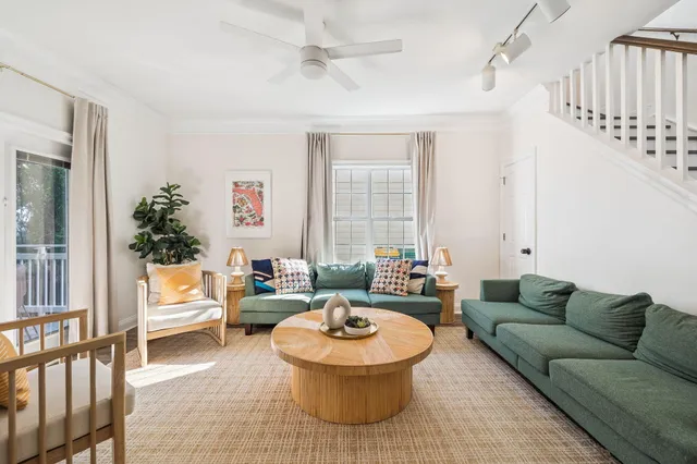 a kitchen with stainless steel appliances granite countertop a sink a refrigerator and a stove