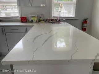 a bathroom with a sink and a window