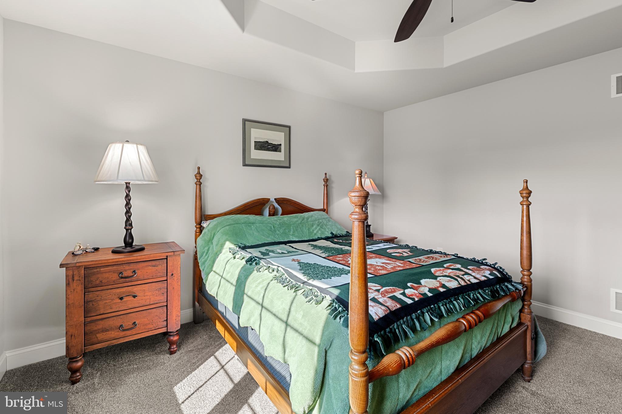 212 Scenic Ridge Boulevard Lebanon, PA 17042 - Photo 14 of 33 a bedroom with bed and a lamp on table