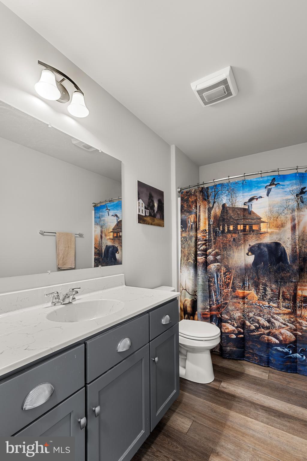212 Scenic Ridge Boulevard Lebanon, PA 17042 - Photo 19 of 33 a spacious bathroom with a double vanity sink mirror and toilet