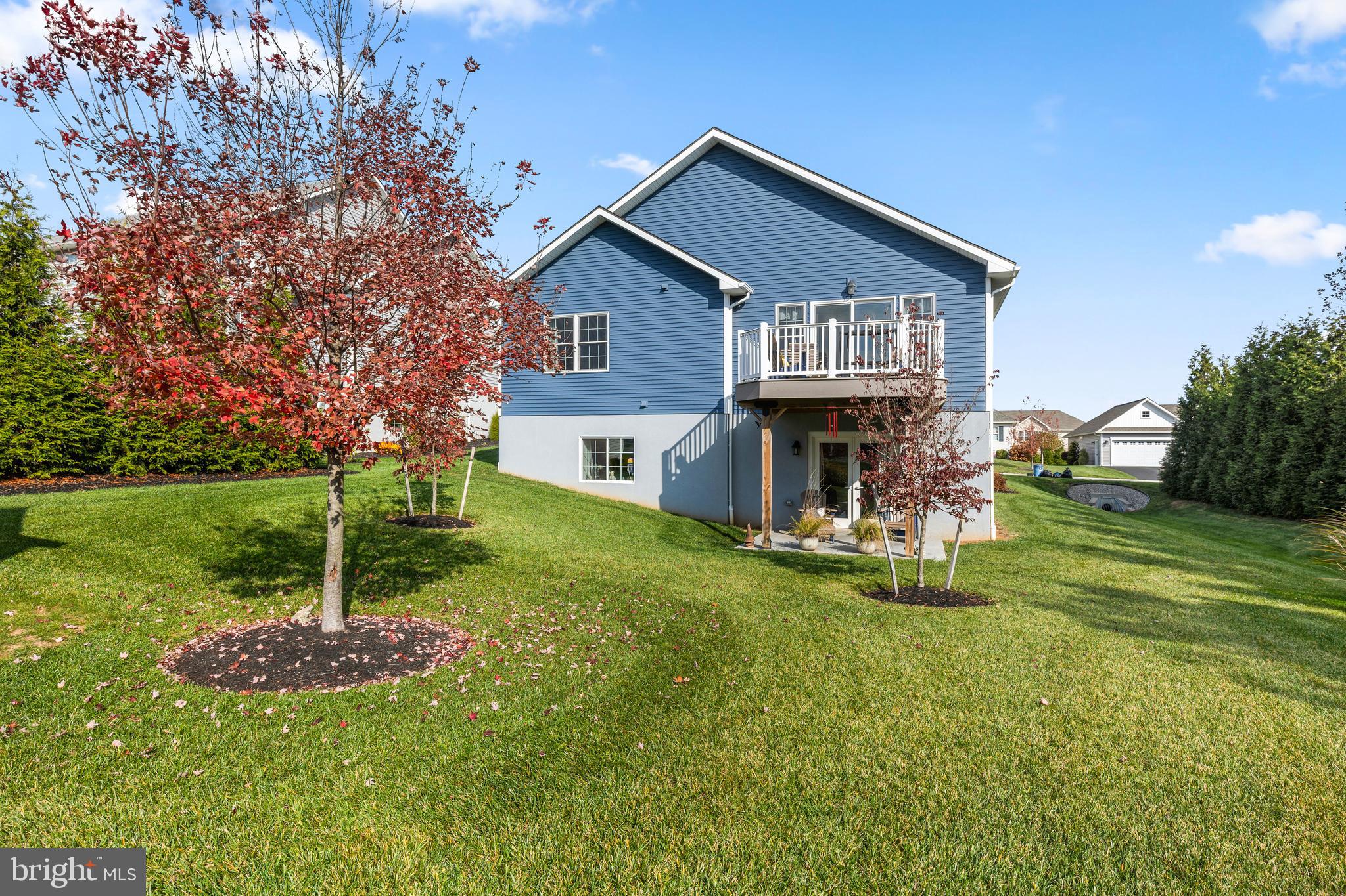 212 Scenic Ridge Boulevard Lebanon, PA 17042 - Photo 33 of 33 a front view of a house with a yard table and chairs