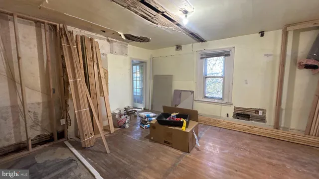 a view of living room with furniture and a flat screen tv