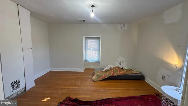 a view of a hallway with stairs