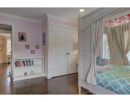 52 Baker Place Newton, MA 02462 - Photo 17 of 24 a living room with a bed furniture and a window