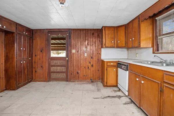 a view of a kitchen with a sink