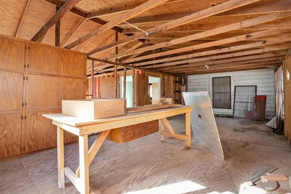 a storage room with wooden floor