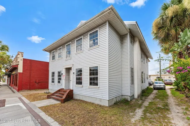 a view of a house with a patio