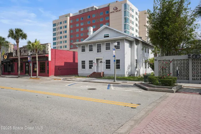 front view of a building with a street