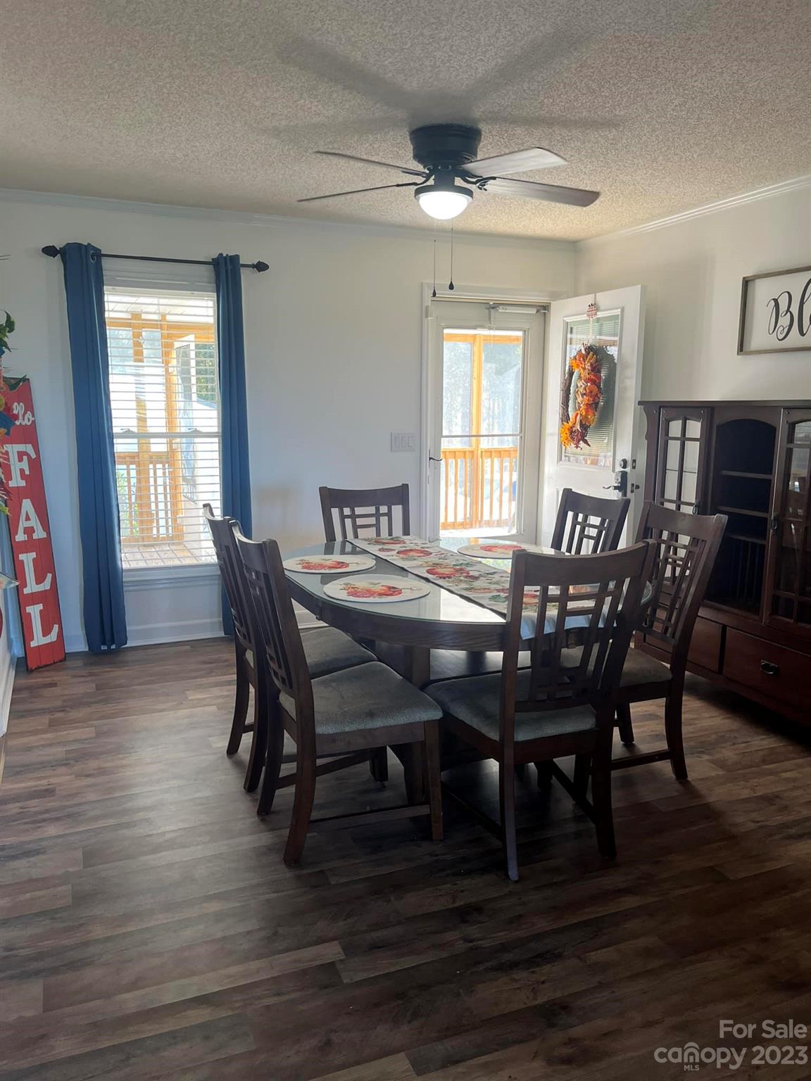 20909 Highway 9 Mount Croghan, SC 29727 - Photo 12 of 21 a view of a dining room with furniture window and wooden floor