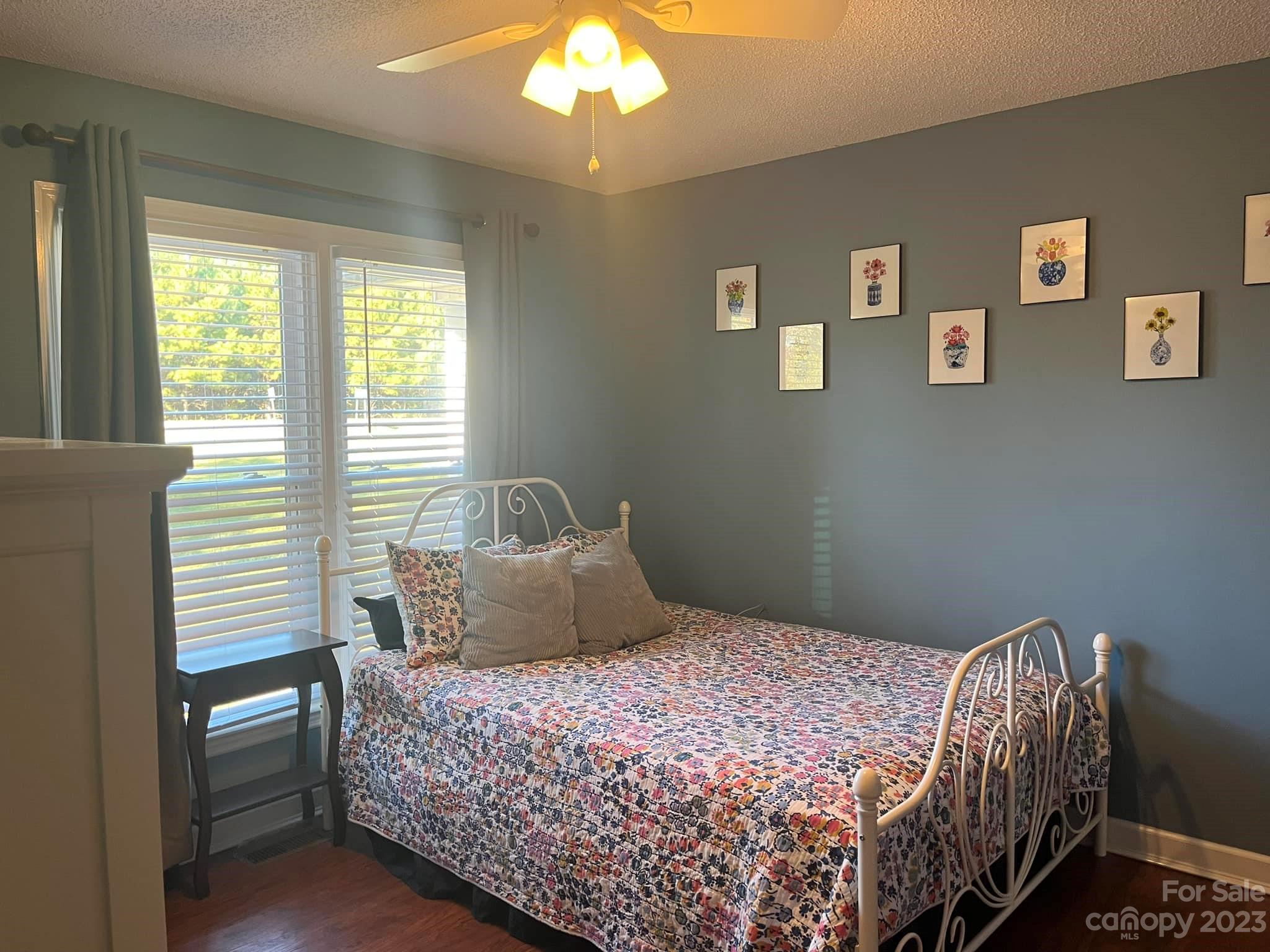 20909 Highway 9 Mount Croghan, SC 29727 - Photo 21 of 21 a bedroom with a bed and a window