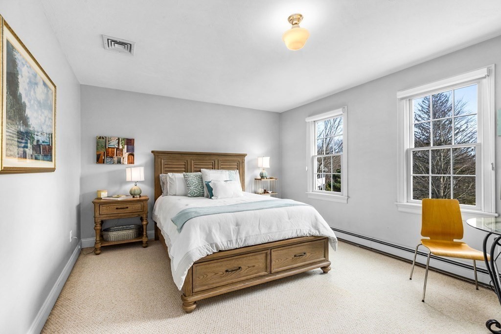 352 Clapp Road Scituate, MA 02066 - Photo 18 of 41 a bedroom with a bed and a window