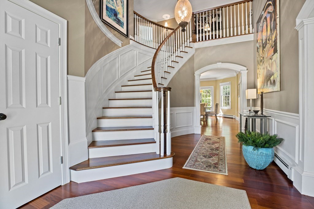 352 Clapp Road Scituate, MA 02066 - Photo 2 of 41 a view of entryway and hall with wooden floor
