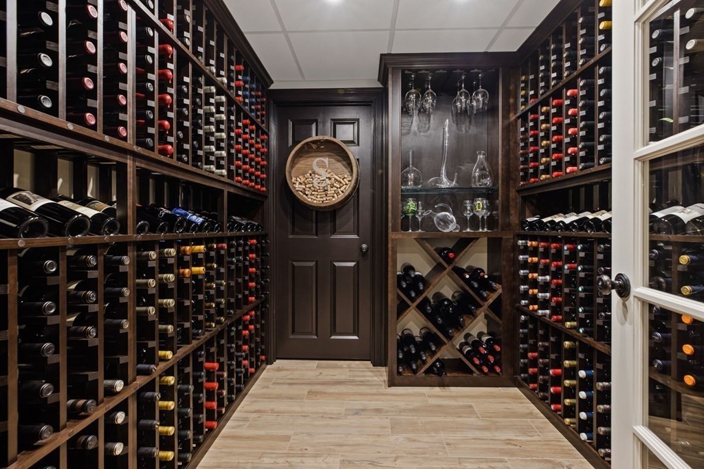 352 Clapp Road Scituate, MA 02066 - Photo 27 of 41 a view of a wooden door and brick wall