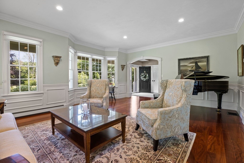 352 Clapp Road Scituate, MA 02066 - Photo 4 of 41 a living room with furniture and a large window