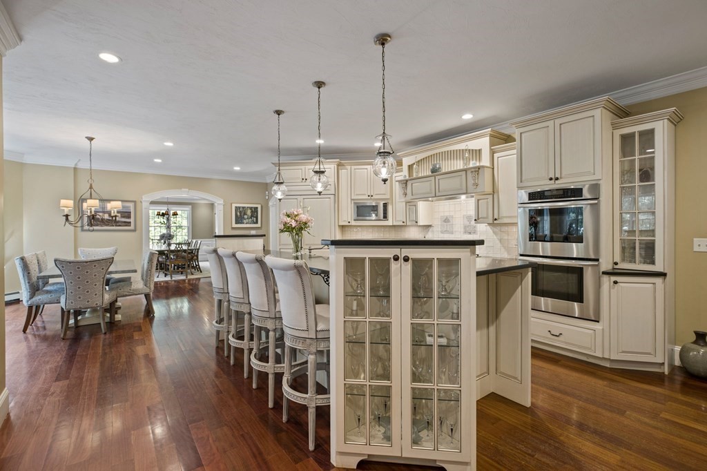 352 Clapp Road Scituate, MA 02066 - Photo 9 of 41 a large kitchen with lots of counter space and stainless steel appliances