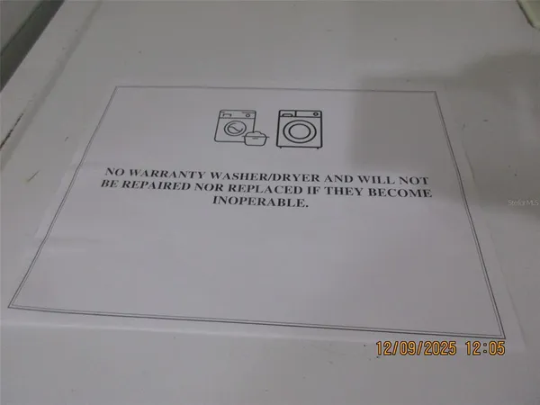 a kitchen with a sink a stove and a refrigerator