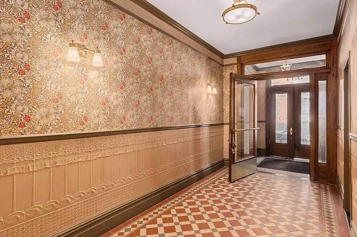 332 East 77th Street, Unit 11 Manhattan, NY 10075 - Photo 8 of 11 a view of a back yard from a balcony