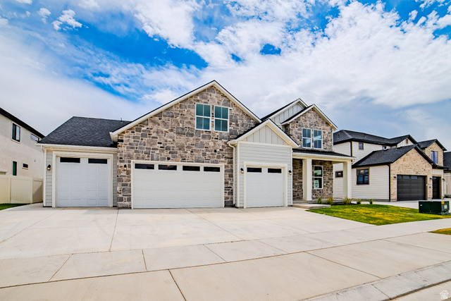 223 South Cottonwood Road, Unit 7501 Vineyard, UT 84059 - Photo 2 of 45 Stone and siding exterior with multiple gables