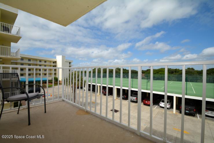 8700 Ridgewood Avenue, Unit B310 Cape Canaveral, FL 32920 - Photo 13 of 23 a view of a large building with a balcony