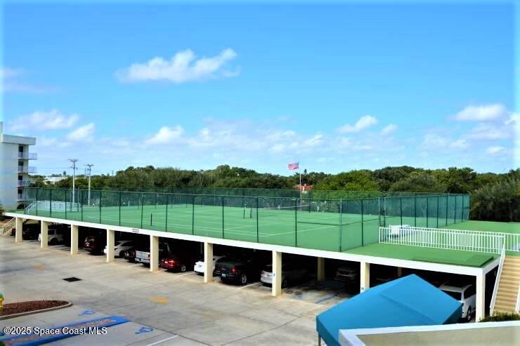 8700 Ridgewood Avenue, Unit B310 Cape Canaveral, FL 32920 - Photo 2 of 23 a view of a roof deck with couches and sky view