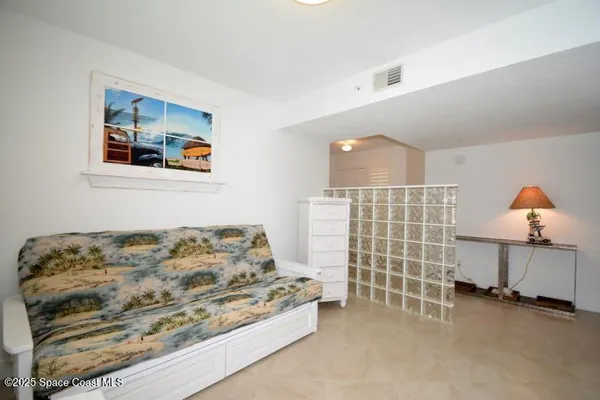 a bedroom with a bed and a cabinets