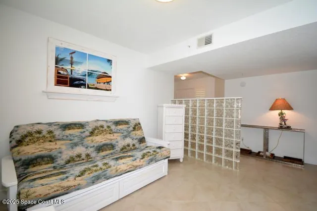 a bedroom with a bed and a cabinets