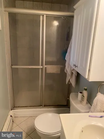 a bathroom with a sink and toilet