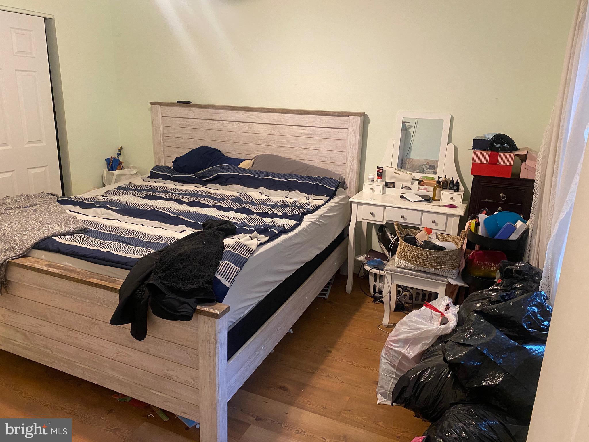 2414 Church Road Cinnaminson, NJ 08077 - Photo 12 of 22 a bed sitting in a bedroom next to a window with pc on it