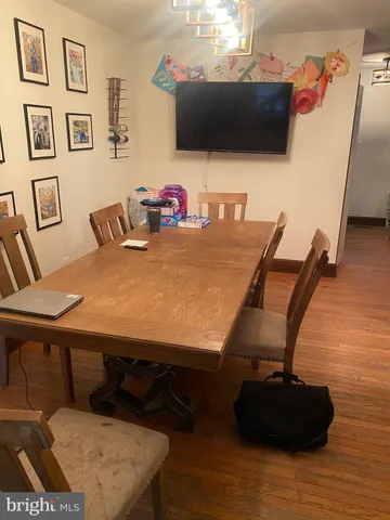 a room with furniture and flat screen tv