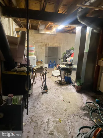 a view of a workspace with furniture