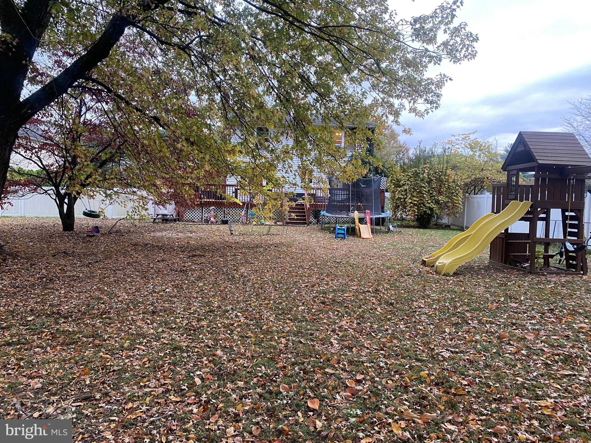 2414 Church Road Cinnaminson, NJ 08077 - Photo 6 of 22 a view of a park with swings and slides