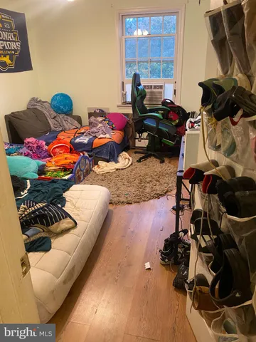 a room with furniture and gym equipment