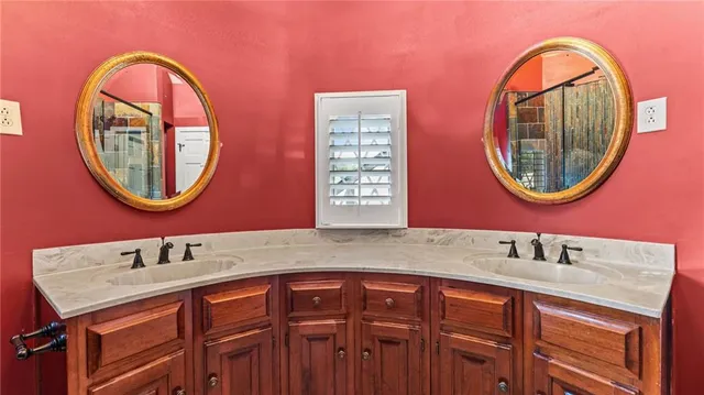 a view of a livingroom with a ceiling fan and window