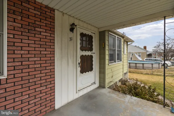 a porch with a glass door