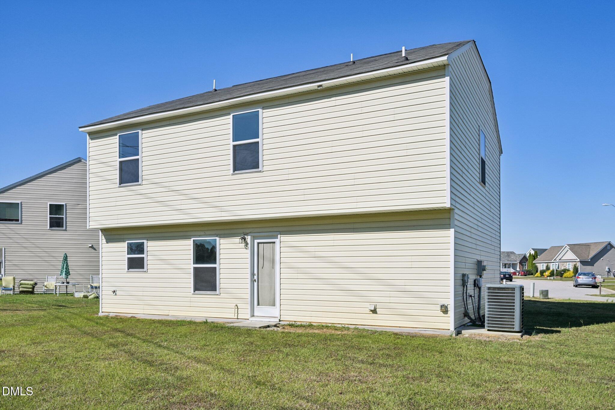 2020 Creek Road Nashville, NC 27856 - Photo 22 of 26 a view of a house with a backyard