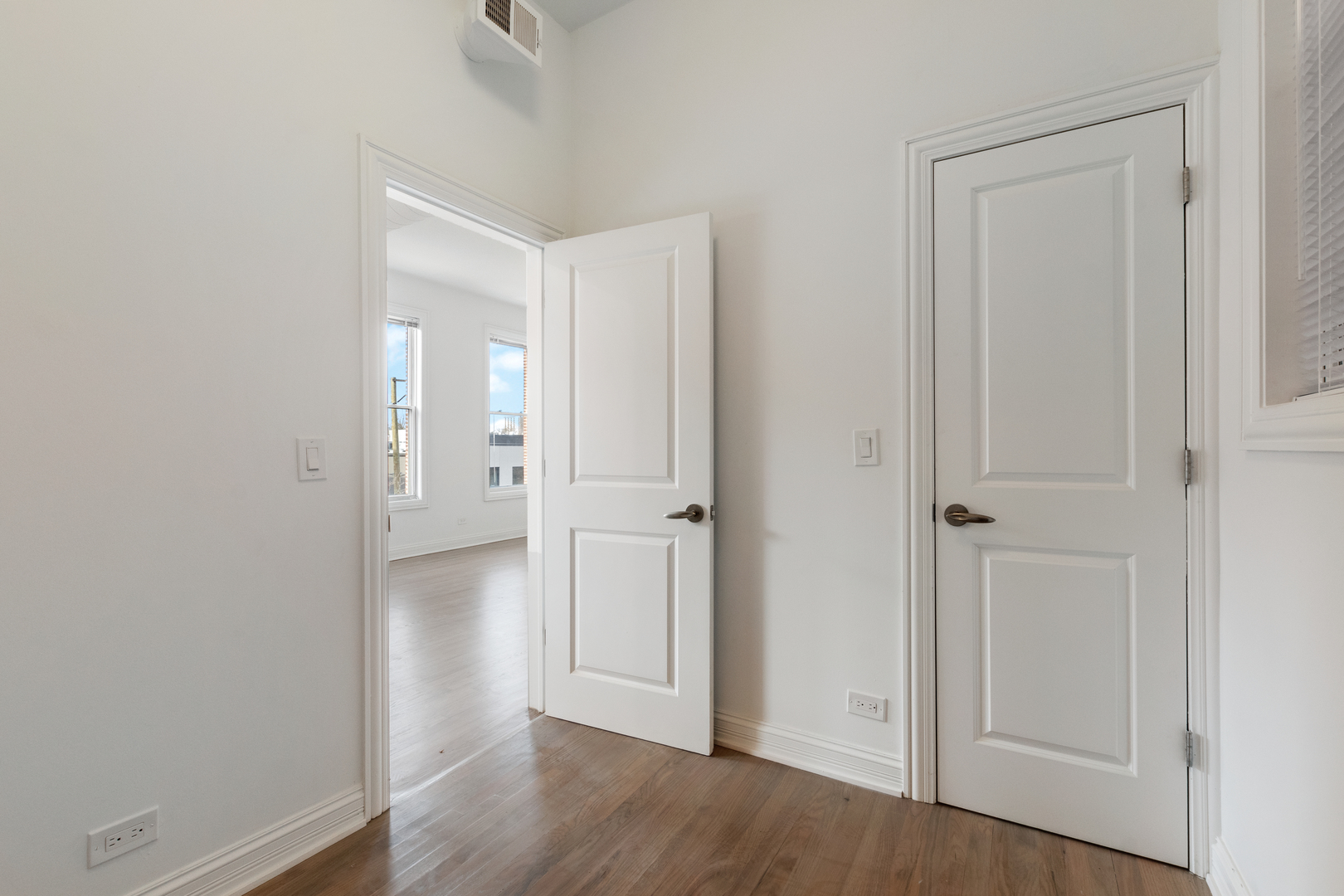 Undisclosed Address Chicago, IL 60622 - Photo 11 of 14 wooden floor with white walls