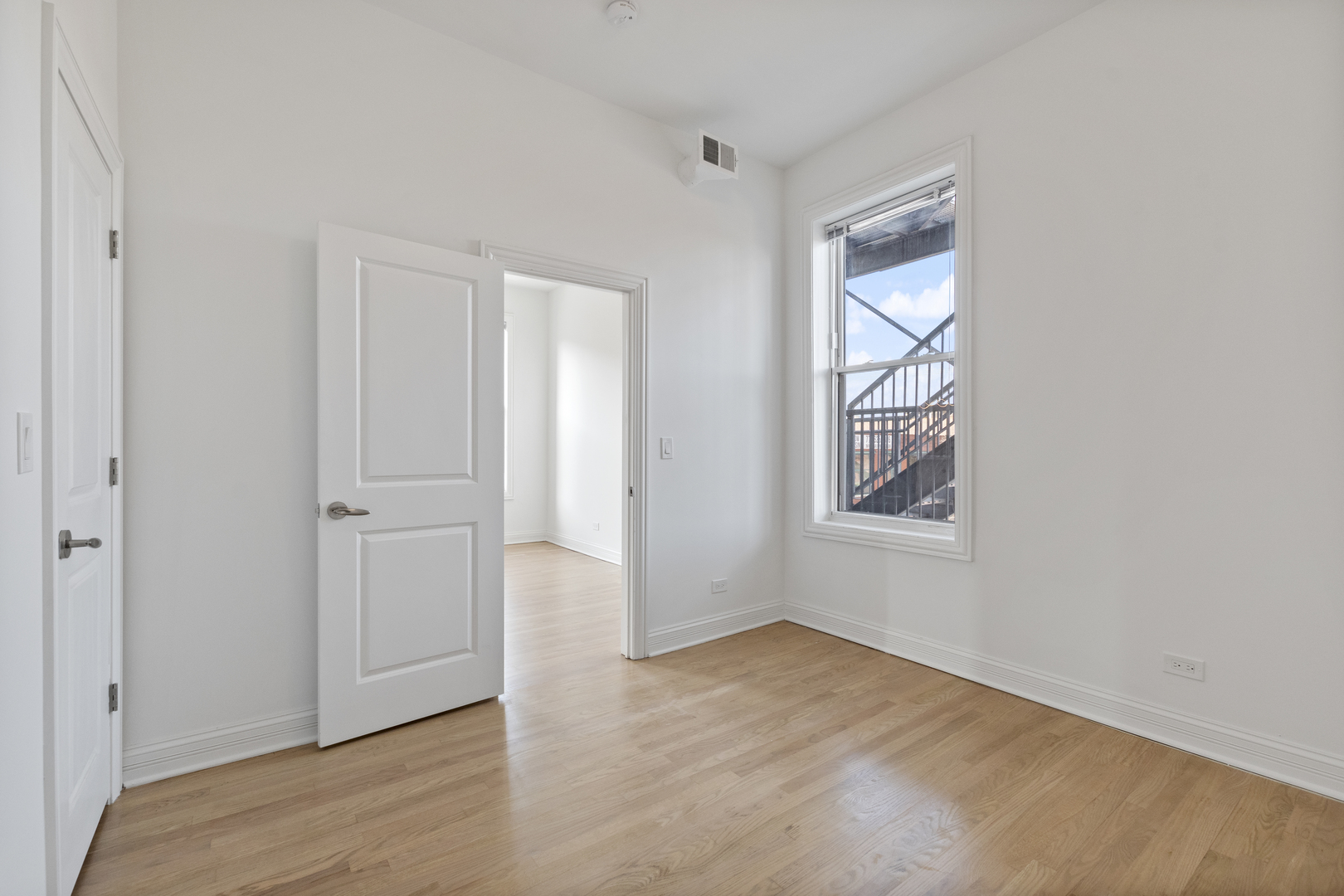 Undisclosed Address Chicago, IL 60622 - Photo 13 of 14 an empty room with windows and closet