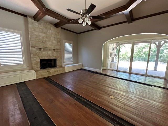 801 Glenmont Road Keller, TX 76248 - Photo 12 of 34 an empty room with wooden floor fireplace and windows