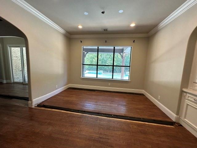 801 Glenmont Road Keller, TX 76248 - Photo 16 of 34 an empty room with wooden floor and windows