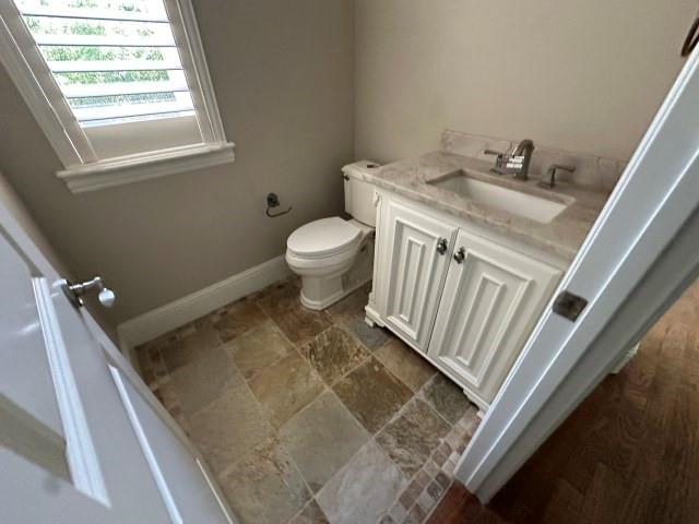 801 Glenmont Road Keller, TX 76248 - Photo 17 of 34 a bathroom with a granite countertop sink toilet and a shower