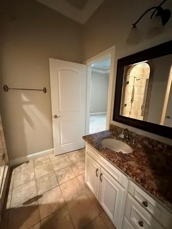 an empty room that has a window in it