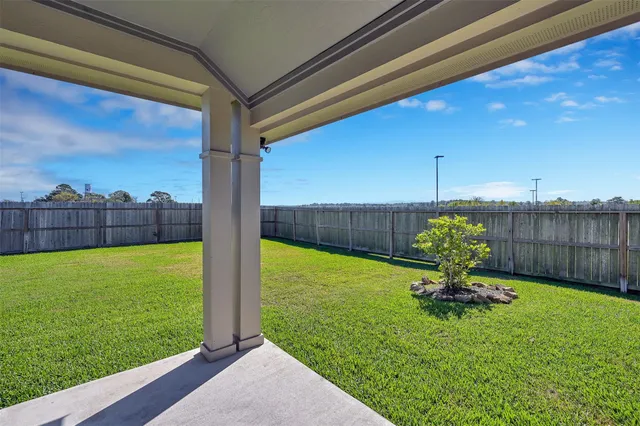a view of a house with a big yard
