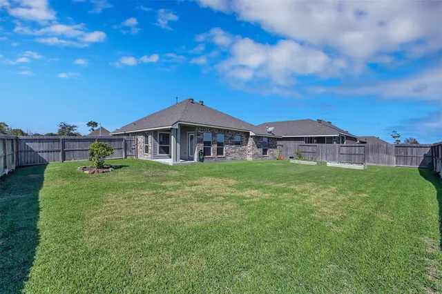 a view of a backyard with a garden