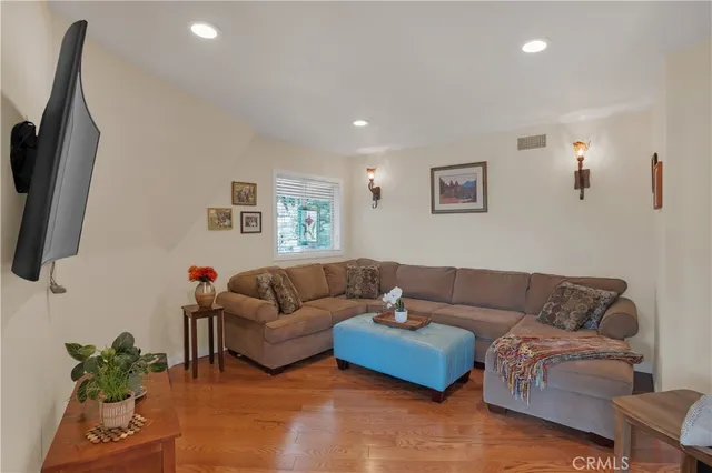 a view of room with window and hardwood