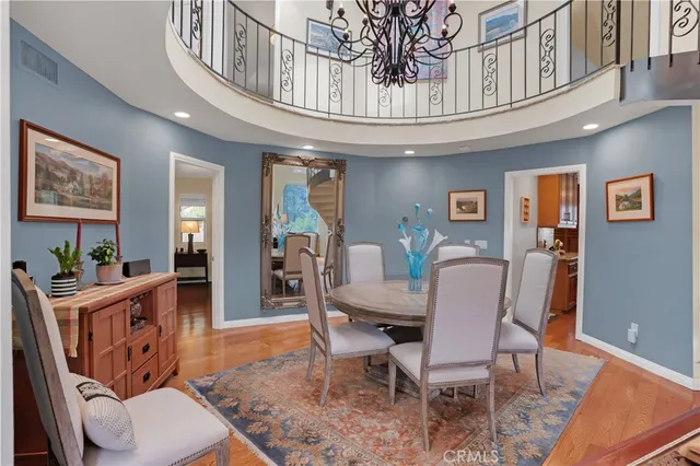a kitchen with stainless steel appliances granite countertop a refrigerator sink and cabinets